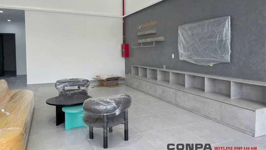Bí quyết chọn màu sơn giả bê tông cho cửa hàng đẹp, hiện đại và hút khách Cửa hàng ô tô sử dụng sơn bê tông màu xám khói