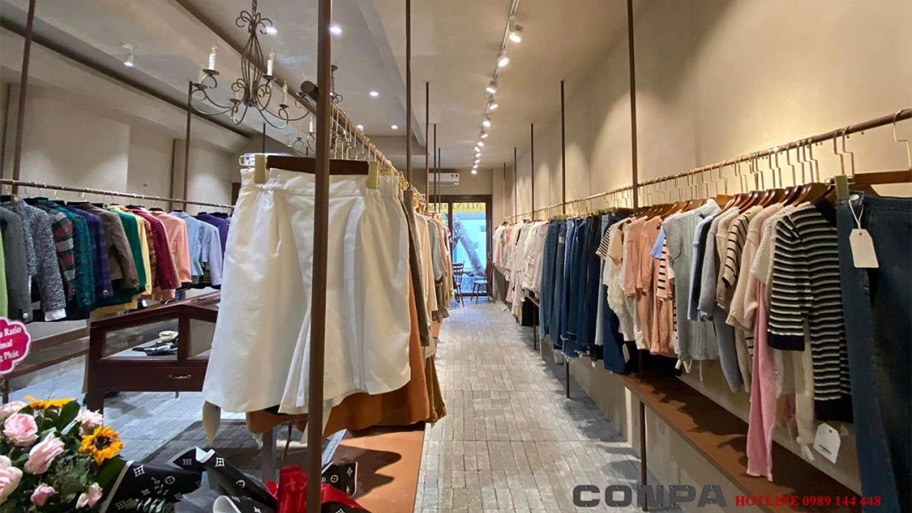 Bí quyết chọn màu sơn giả bê tông cho cửa hàng đẹp, hiện đại và hút khách Cửa hàng thời ttrang sử dụng sơn bê tông màu kem sáng